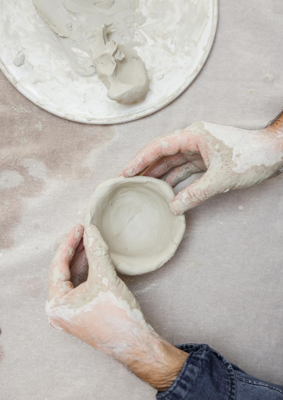 Clay being worked by hand